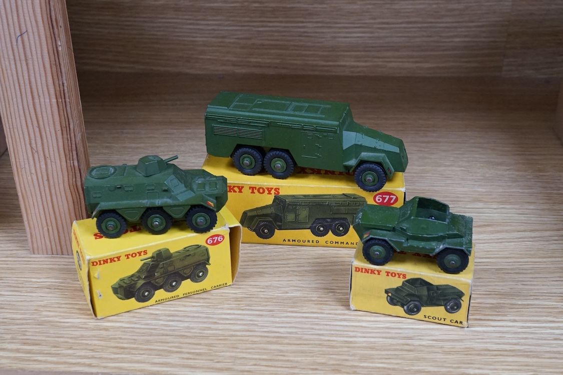 Nine boxed Dinky Toys military vehicles; Armoured Command Vehicle (677), Scout Car (673), Armoured Car (670), Army Water Tanker (643), Army 1-ton Cargo Truck (641), Armoured Personnel Carrier (676), Army Covered Wagon (6